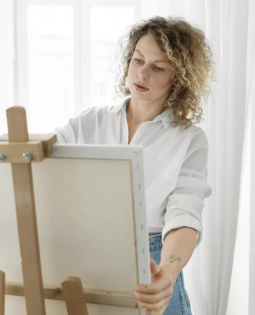 Fractional services a women standing to white board