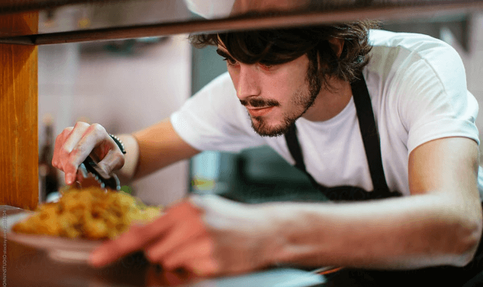 Hospitality Consulting Chef Plating up food